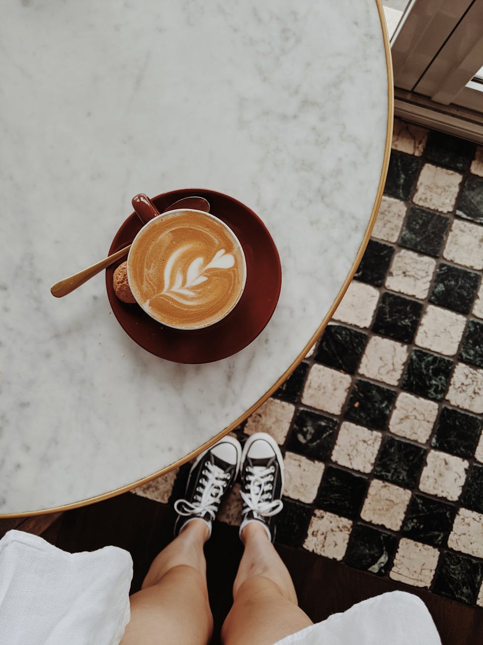 a coffee drink with steamed milk